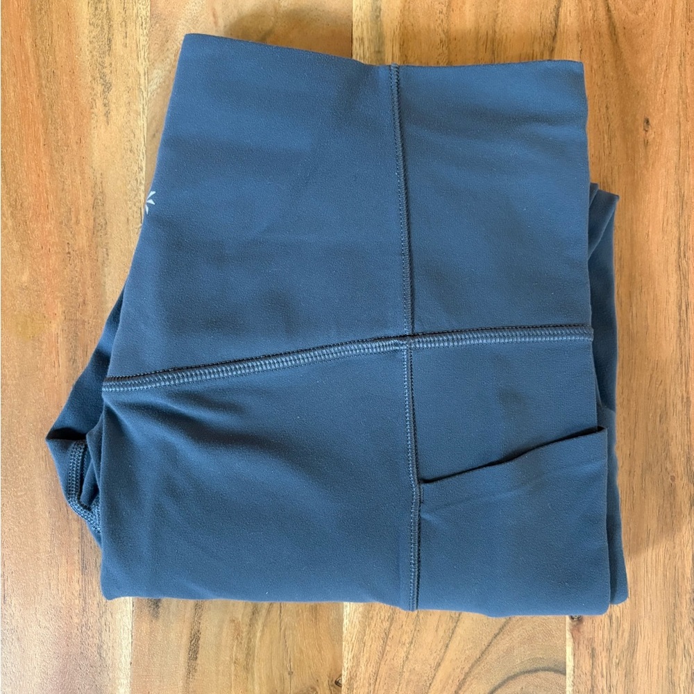 Athleta Salutation Stash Tight in Grey/Blue